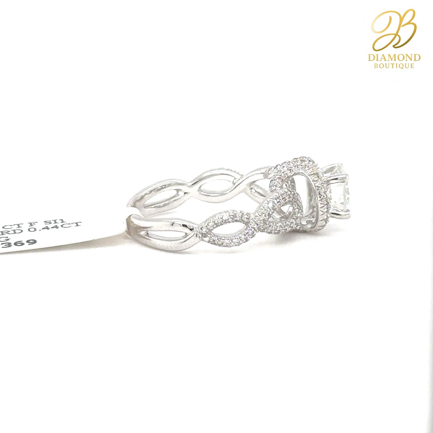 1.01 CT ROUND TWISTED SHANK RING